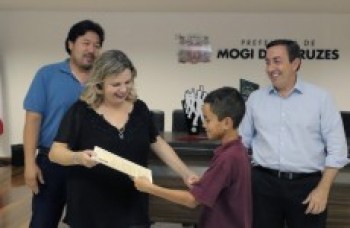 Banda campeã e alunos são homenageados